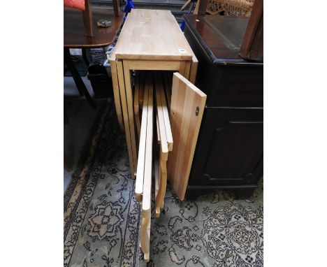 Modern Light Wood Drop Flap Table with Chairs Stowed Inside 