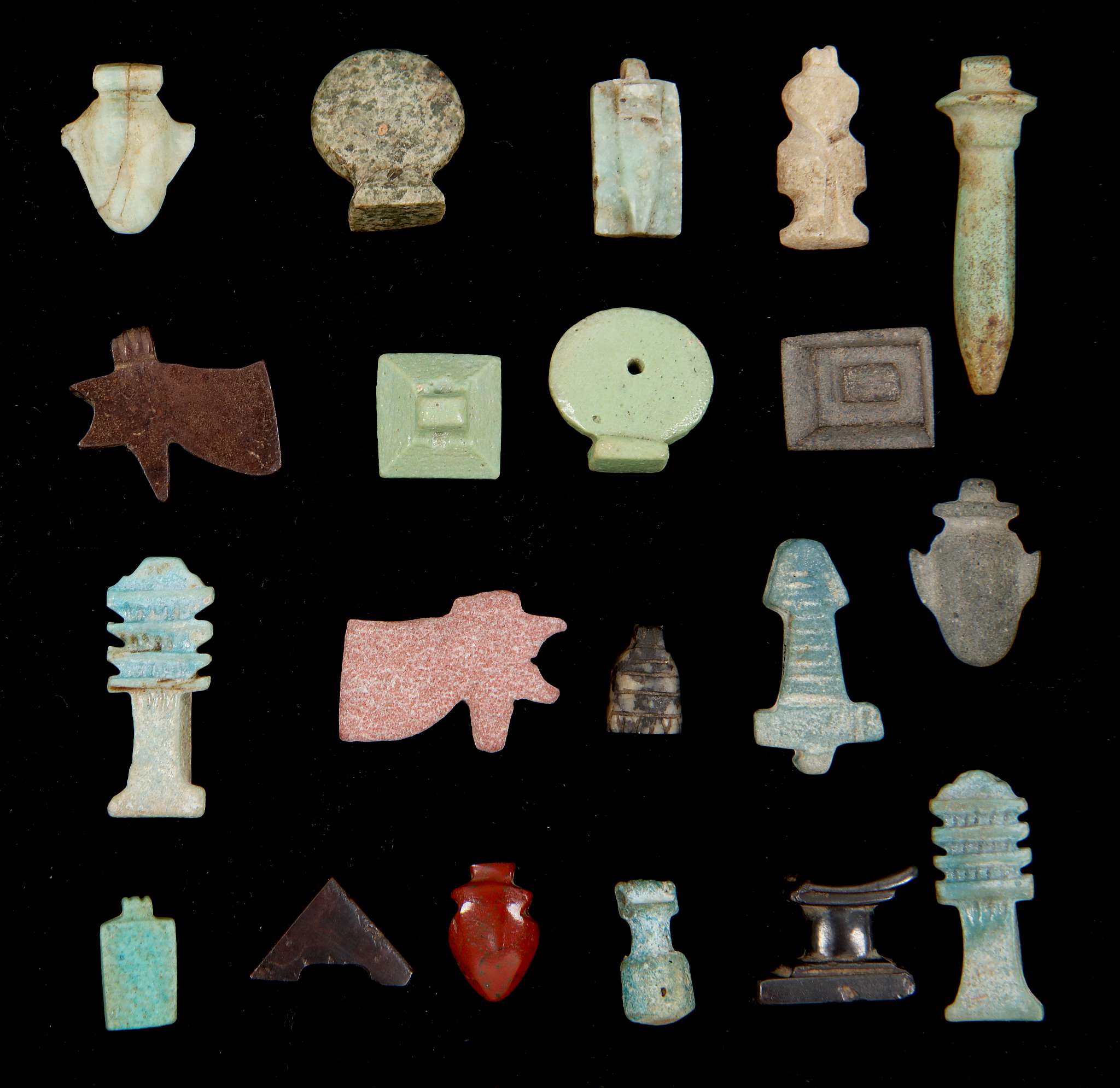 TWENTY EGYPTIAN AMULETS Third Intermediate Period to Late Period, circa ...