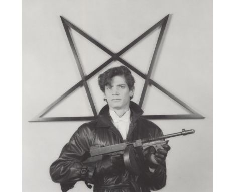 Artist: Robert Mapplethorpe (American, 1946 - 1989). Title: "Self-portrait with Gun and Star". Medium: Original vintage photo