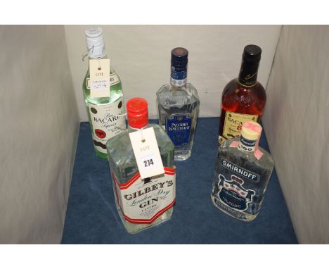A 1 litre bottle Gilbey's London Dry Gin; a 1/2 bottle of Smirnoff Vodka; a 1/2 bottle of Diamond Premium Vodka; a 70cl. bott