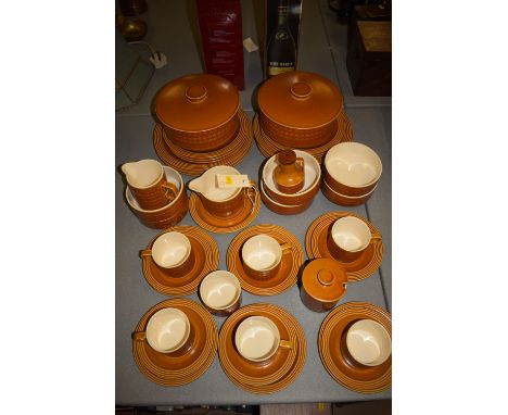 A Hornsea 'Saffron' part tea and dinner service, comprising: cream, teacups, saucers, side plates, dinner plates, tureens, pr