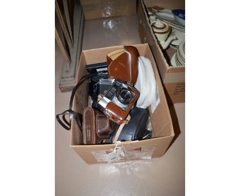 A collection of cameras, to include: a Halina 35X; an Optima Compur camera; a Canon QL19 camera; etc.