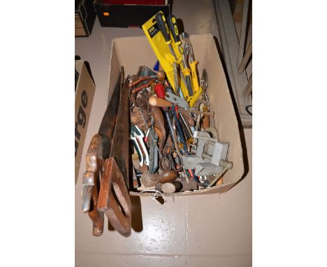 A large collection of tools, to include: saws; a Stanley No. 702 vice; hand drills; spirit levels; mallets; etc., in a box.