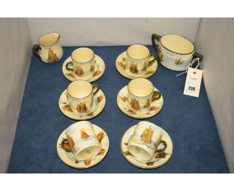 A Royal Doulton coffee set, decorated with sailing boats, comprising; cream jug; sugar bowl; six coffee cans and saucers numb