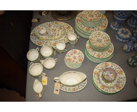 A Mintons "Haddon Hall" part dinner and tea service designed by, John Wadeworth, comprising: dinner plates, side plates, tea 