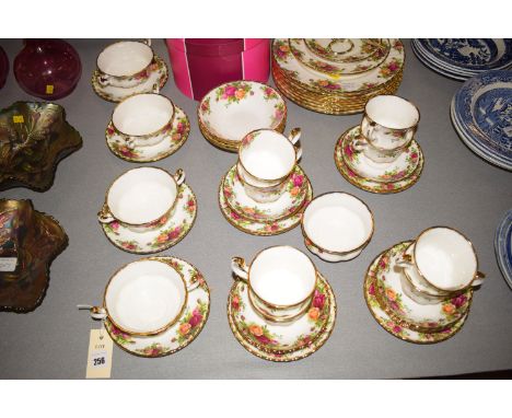 A modern Royal Albert 'Old Country Roses' pattern part dinner and tea service, approximately 6-8 place settings.