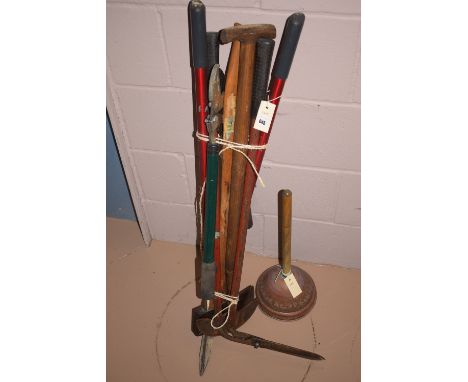 A bundle of garden tools.