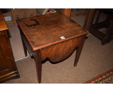 A Georgian mahogany commode stool.