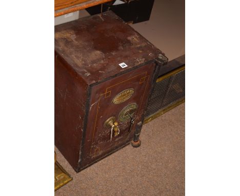 A small iron safe, by R. Foster & Co, Birmingham.