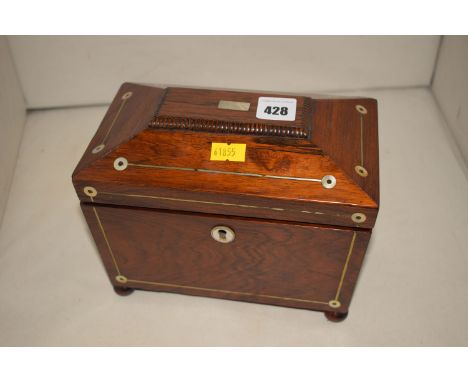 A Victorian rosewood tea caddy, with brass and mother-of-pearl inlay, opening to reveal two compartments, raised on bun feet.