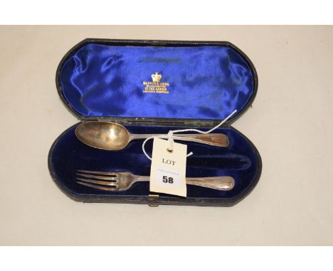 A Victorian silver christening spoon and fork (missing knife), in fitted case.