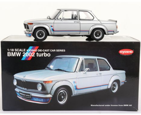 Kyosho BMW 2002 Turbo 1:18 scale model,  metallic silver diecast body, in mint pre owned condition, with white polystyrene in