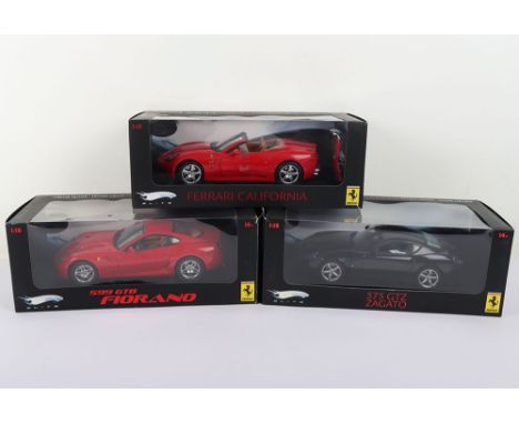 Three Boxed Hot Wheels Elite Ferrari 1:18 Scale models, J2917-0510 Ferrari 599 GTB Fiorano red body, L2983 Ferrari 575  GTZ Z