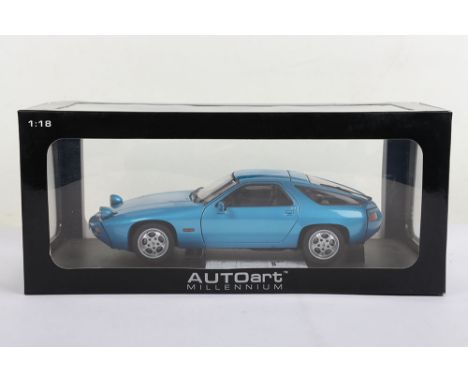 Autoart Millennium Porsche 928, 1:18 Scale, Minerva blue metallic diecast body, in near mint pre owned condition, has been on