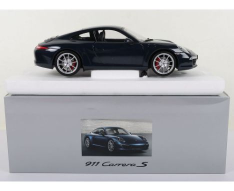 Pauls Model Art/Minichamps  1:18 Scale Porsche 911 Carrera, metallic dark blue diecast body, in mint pre owned condition, out