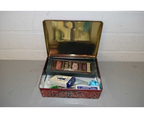 TIN CONTAINING KNIVES, GLASS STEM VASES, PLAYING CARDS ETC