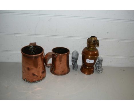 TWO COPPER TANKARDS AND A COPPER OIL LAMP TOGETHER WITH TWO CARVED AFRICAN FIGURES