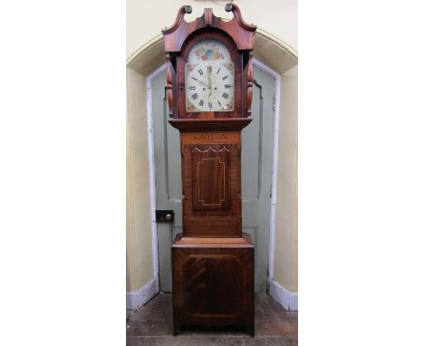 A substantial Regency longcase clock, the mahogany case with inlaid detail, the hood with swan neck pediment and column suppo