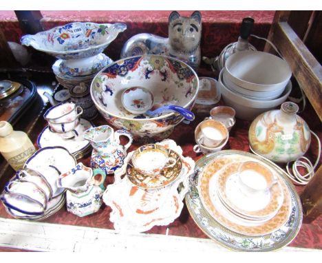 A collection of mainly 19th century china including ironstone plates, large punchbowl and ladle, two ironstone jugs with serp