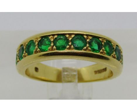 18ct emerald half hoop ring, set with ten emeralds 1ct total approx, maker 'DB' London 1991, size O, 7.3g 