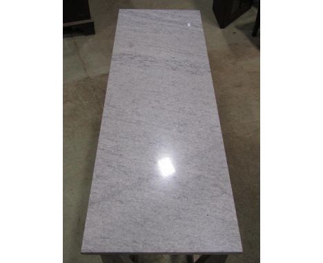 A console/pier table with rectangular marble top raised on open x framed supports with lime wash type finish, 122 cm wide x 4