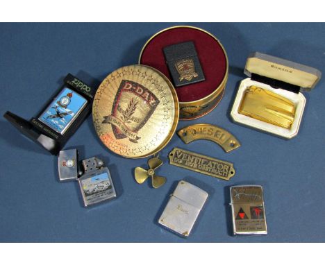 A collection of Zippo lighters with enamel detail Battle of Britain 1940, Dambusters Raid 1943, Lancaster Bomber Command 1941