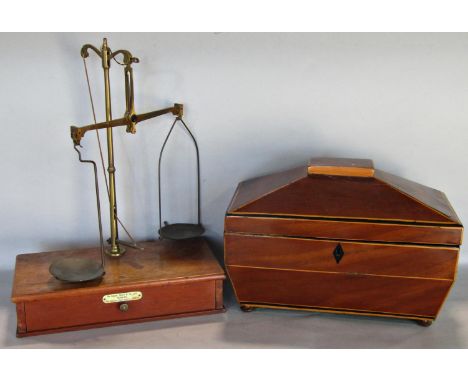 A Regency sarcophagus shaped two divisional tea caddy with string inlaid detail, a set of brass balance scales by De Grave Sh