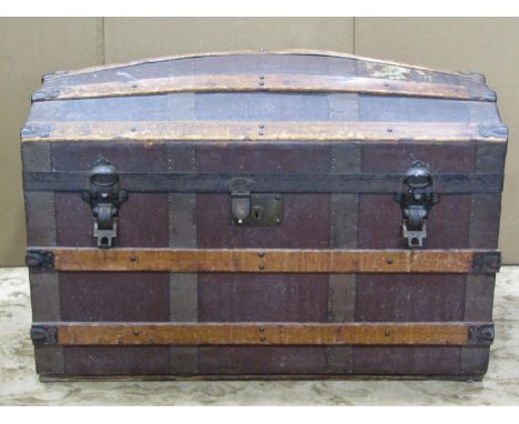 A vintage lathe bound domed top travelling trunk 82 cm long x 45 cm deep x 55 cm high, together with a further similar smalle