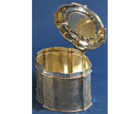 A silver tea caddy with hinged lid, London 1926, maker Garrard, 10.5cm wide x 9cm high, 10.3oz approx 