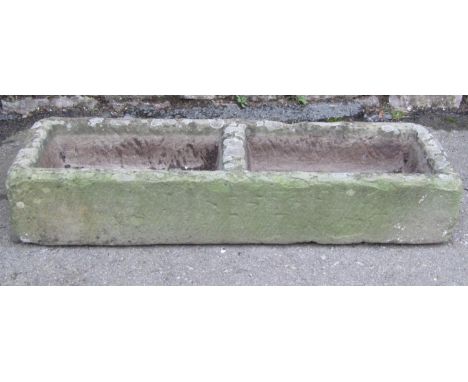 A carved natural stone two divisional rectangular trough 85 cm long x 29 cm wide x 14 cm deep 