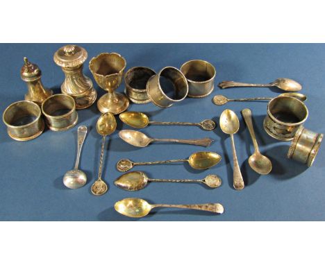 A cased set of six silver teaspoons, cased set of six silver teaspoons and a sugar tong, seven various napkin rings, assorted