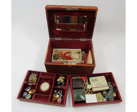 Antique red Morocco leather jewellery box containing a selection of costume jewellery to include an Egyptian Revival bracelet