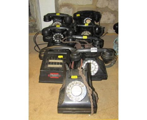 Seven vintage Bakelite Pyramid and plastic GPO rotary telephones and a switchboard telephone (8) 
