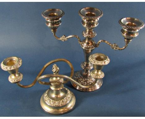 A silver Georgian style candelabra with three removeable sconces, Birmingham 1974, maker W.I. Broadway &amp; Co, together wit