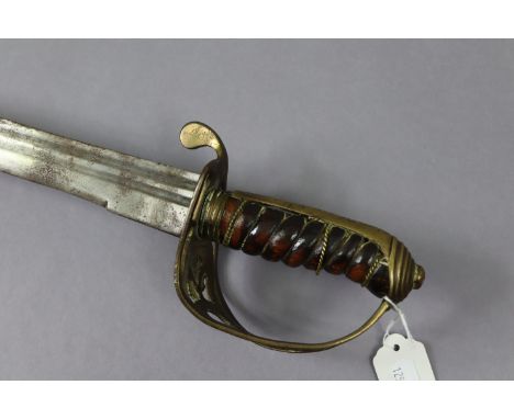 A 19th century Indian cavalry officer’s sabre with 30” long single edge curved blade &amp; with pierced basket hilt, lacking 