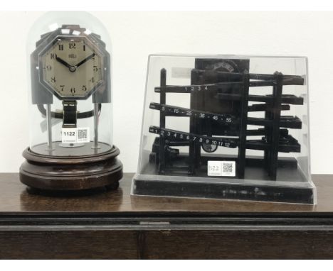 Art Deco Bulle electric clock, octagonal silvered Arabic dial with stepped surround, movement stamped France 319899, on turne