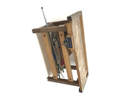 Hardwood work bench with undertier, fitted vice (W151cm, H81cm, D69cm) and small quantity of garden tools Condition Report Cl