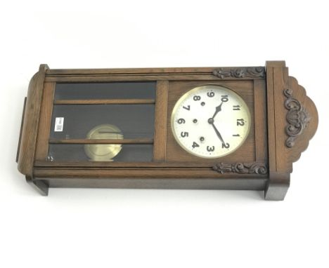 20th century oak wall clock, silvered Arabic dial with glazed door, three train movement chiming the quarters on rods, H79cm 