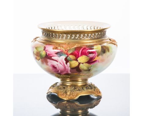 ROYAL WORCESTER PEDESTAL BOWL
of squat baluster form and with pierced rim, decorated with pink roses and foliage on an ivory 