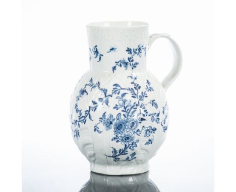 18TH CENTURY ENGLISH BLUE AND WHITE CABBAGE LEAF JUG
possibly Worcester, with flower sprigs and insects, the broad loop handl