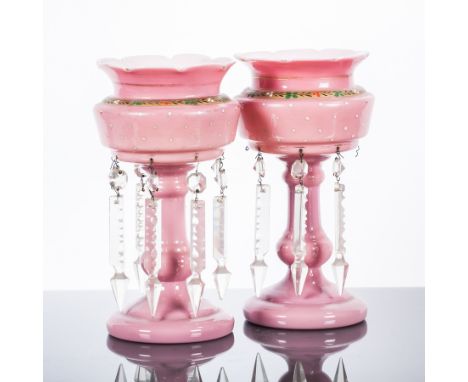 PAIR OF VICTORIAN GILT ENAMEL GLASS LUSTRES
in pale pink, with wavy rims and with floral enamel decoration, on circular bases