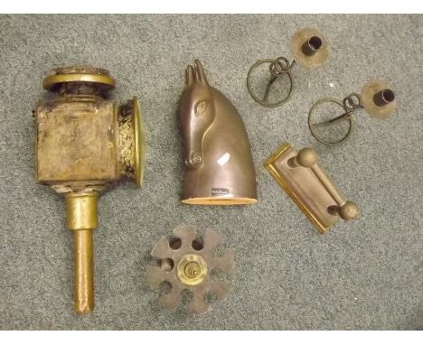 A mixed lot of bygones to include a carriage lamp, a desk top stand, a sculpture of a horses head and two candlesticks and a 