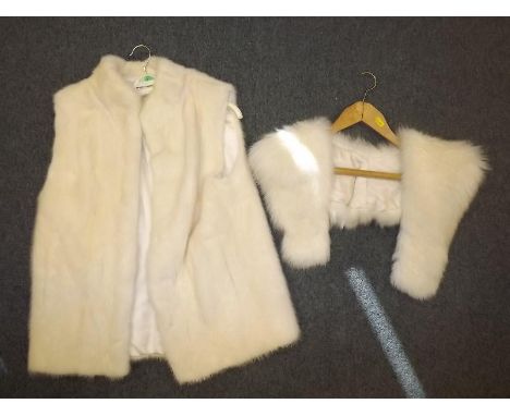 A good quality pearl mink gilet, hook and eye fastening and slit pockets, fully lined with embroidered label AB, length from 