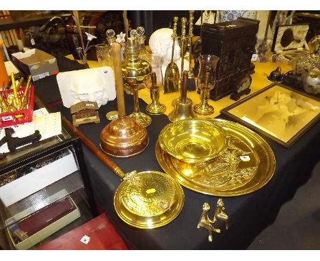 A collection of brass ware to include tray, oil lamp, fire tender and similar (qty)