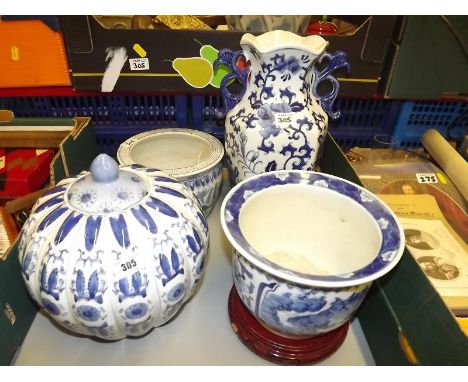 A mixed lot to include a collection of blue and white predominantly oriental ceramics to include a large lidded vase, jardini