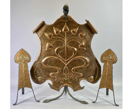 ART NOUVEAU COPPER FIRESCREEN, the shaped copper panel hammered and with stylised floral motifs, scrolled at the top and bott
