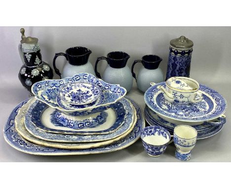 LOVATTS LEADLESS GLAZE a set of three graduated jugs, light blue bodies, dark blue necks and handles, 18cms H the tallest, 19