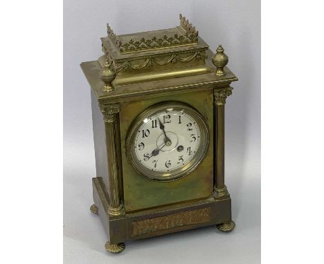 GILT BRASS CASED MANTEL CLOCK - late 19th century, circular silvered dial with black Arabic numerals, flanked by Corinthian c