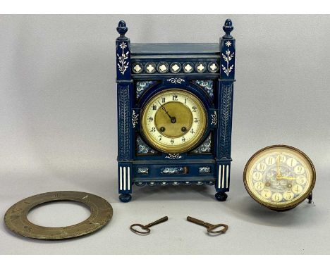 ARTS &amp; CRAFTS MANTEL CLOCK in painted case with carved detail, circular cream and gilt dial with black Arabic numerals, e