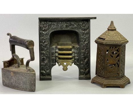 A VICTORIAN CAST IRON &amp; BRASS SAMPLE FIREPLACE, 17.5cms H, 15.5cms W, a Victorian cast iron bank of hexagonal pillar form